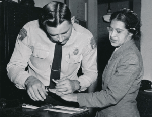 Rosa Parks being fingerprinted on February 22, 1956, by Lieutenant D.H. Lackey