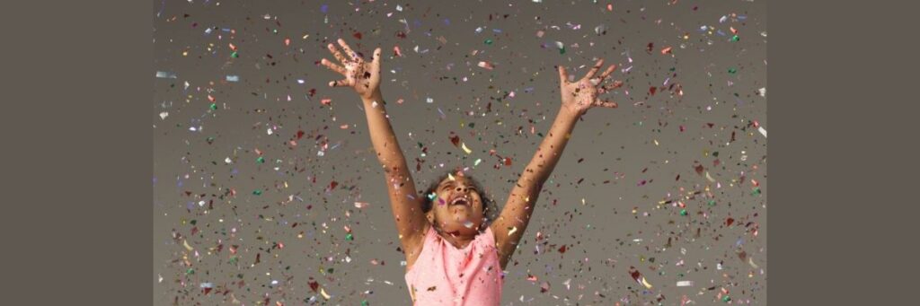 child celebrating