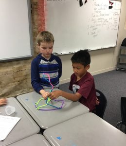 Students build a pipe cleaner tower, courtesy Dusti Street 