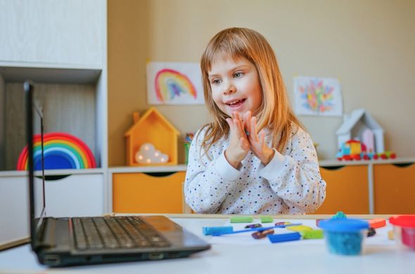 Child Doing Art Activity During End-of-Year Celebration.