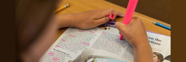 Student highlighting Studies Weekly