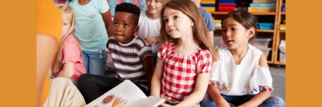 Teacher reading to students.