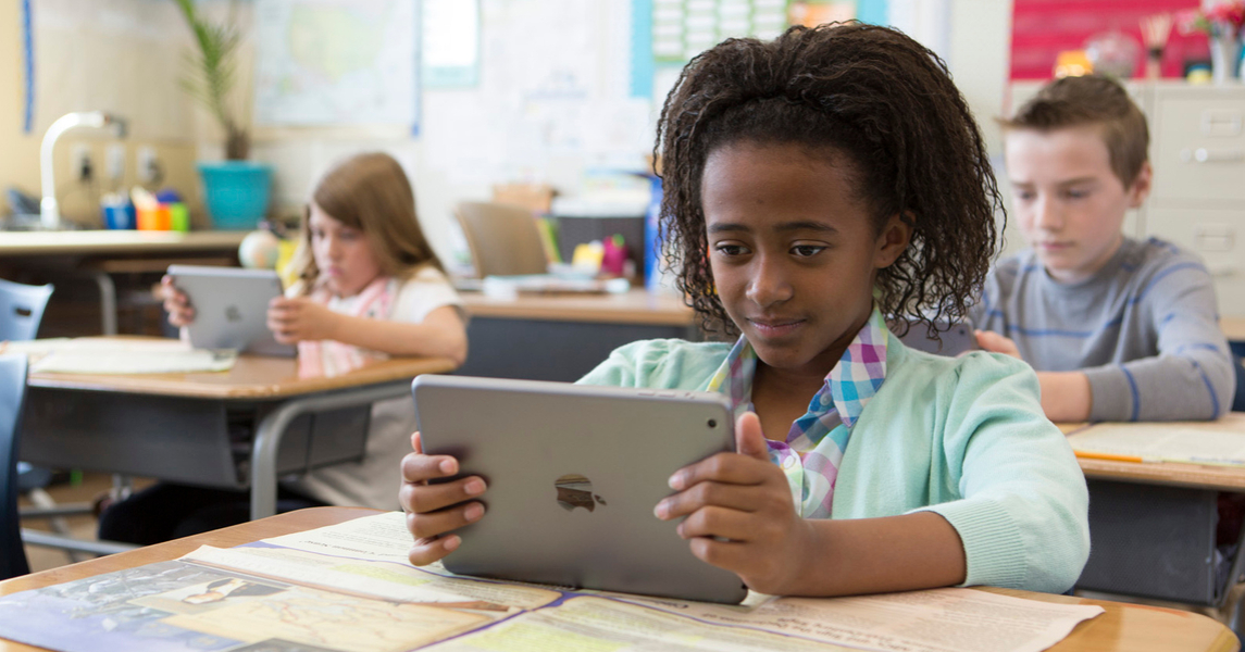 Studies Weekly Online Student Accounts Studies Weekly Student using an iPad with Studies Weekly Online