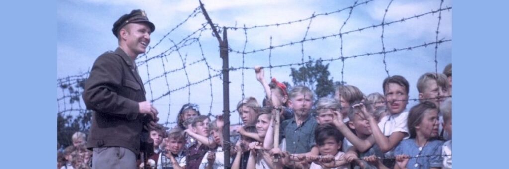 Berlin Candy Bomber with children