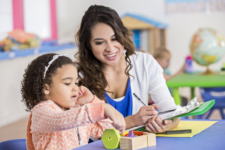 Administrator with student Participate in the lesson during teacher observation