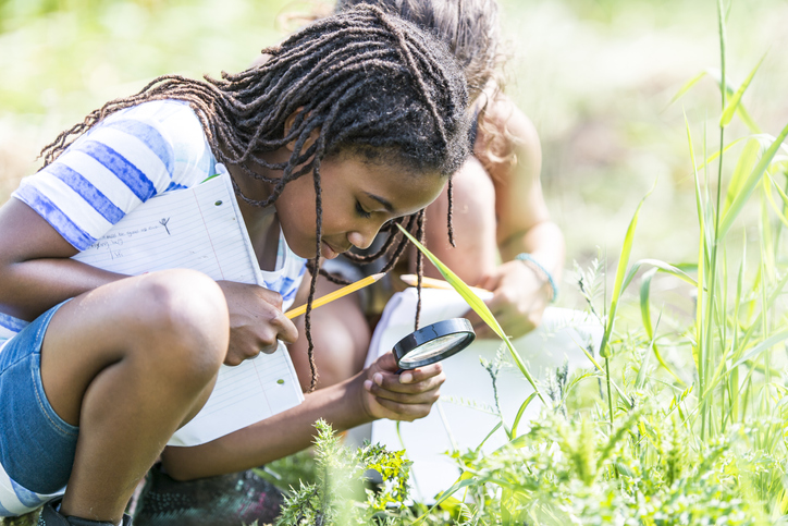 Students learning outside for summer school
