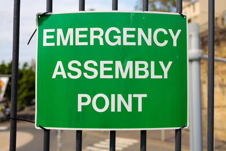 Emergency assembly point sign as part of school emergency operations plan.