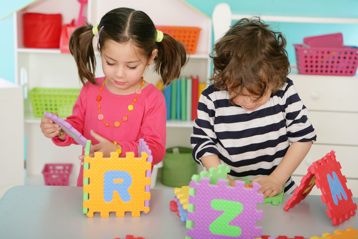 early development Preschoolers learning letters as part of early childhood education