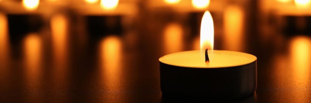 Holocaust-Remembrance-Candle-September-2025 Lit candle in remembrance of the Holocaust