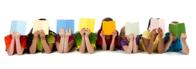 Reading Students Student covering their faces with colorful books suggesting Reading Struggle