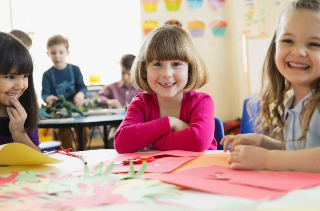 Kids making collages