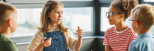 Students sitting in a circle teaching each other to help increase their memory power