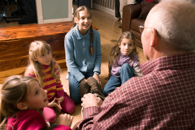Family primary sources Children listening to grandparent