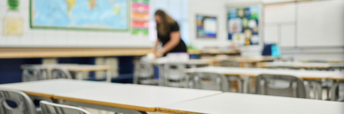 Teacher Prepping Classroom