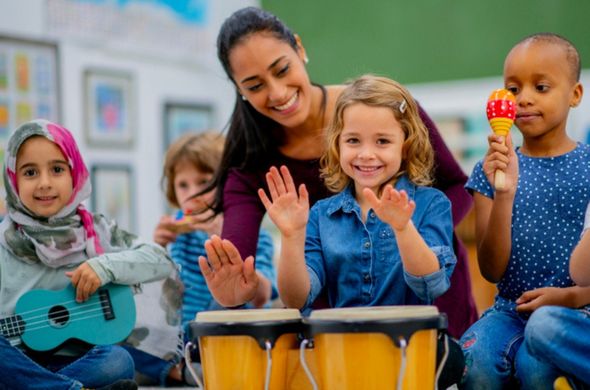 Students playing instruments from around the world to learn geography and social studies with music