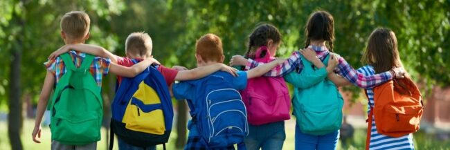 School-Friends-Walking-in-a-Line Children walking together to summer school