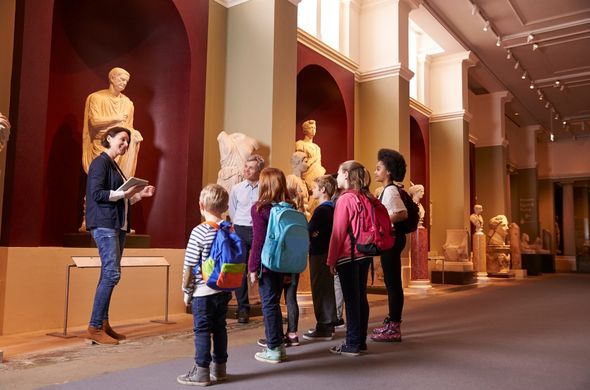 Students learning at a museum