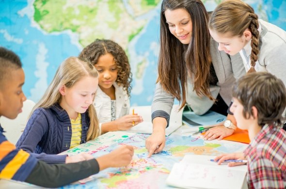 Students studying a map