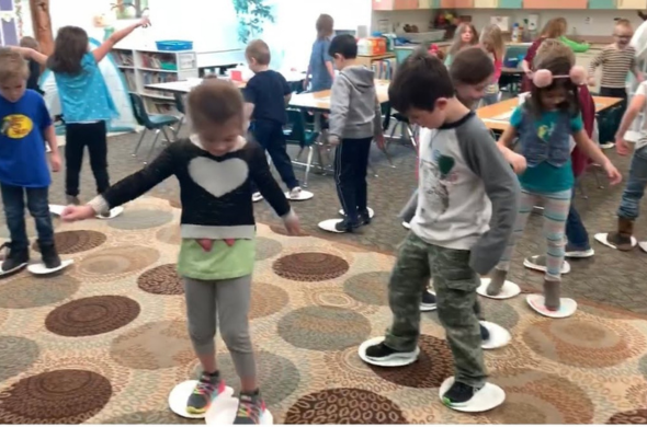 Kids playing and sliding to music Kids playing and sliding to music as a part of integrating music and social studies