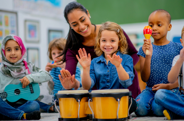 Students playing instruments (1) Students playing instruments from around the world to learn geography and social studies with music