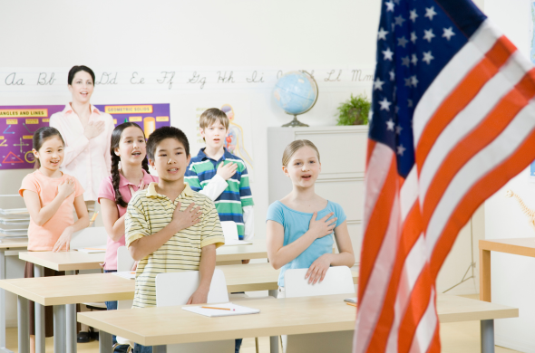 Students singing Pledge of Allegiance Students learning Pledge of Allegiance, National Anthem, and other patriotic songs to integrate music and social studies