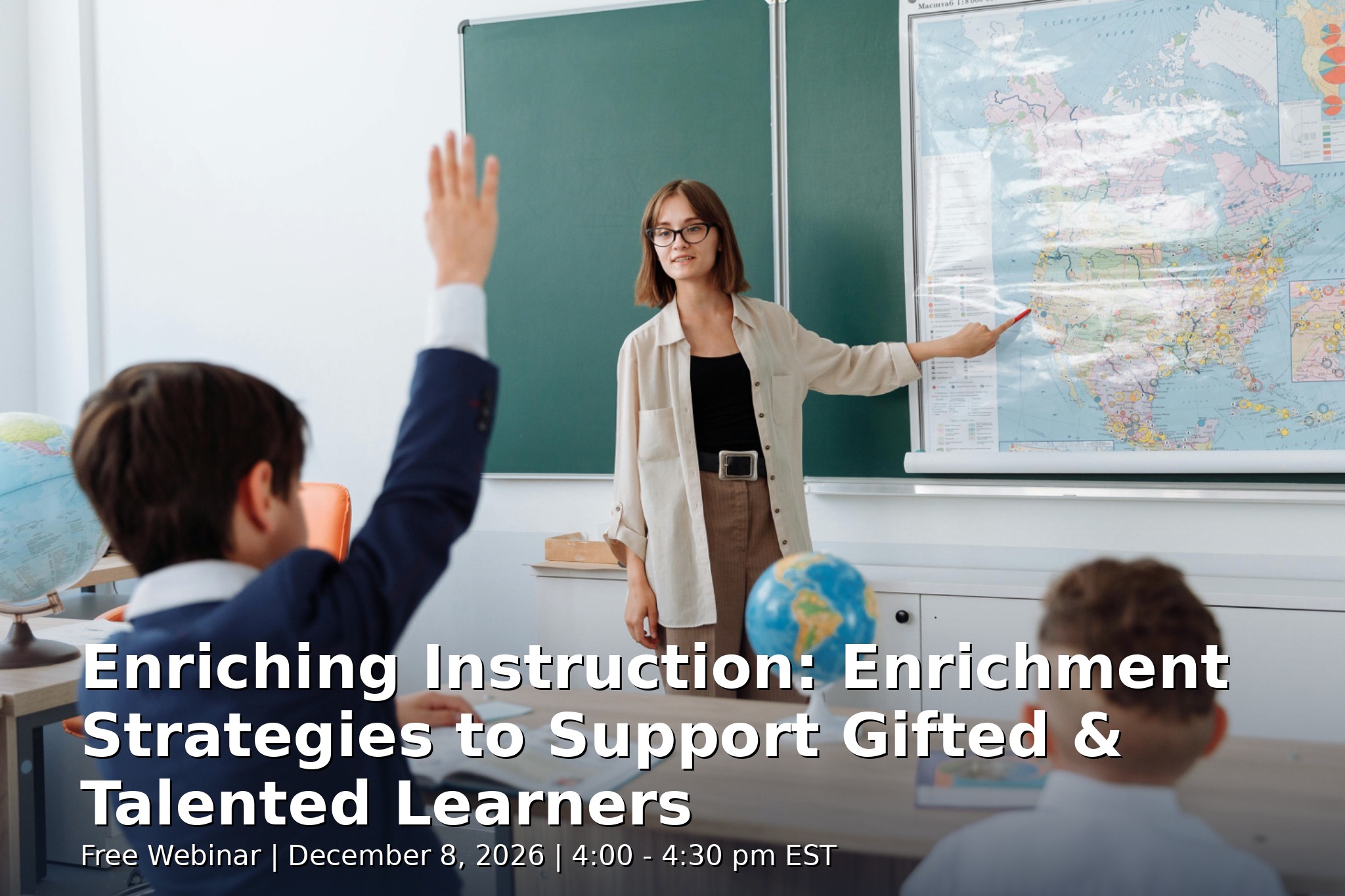 teacher in classrooms with students raising hands