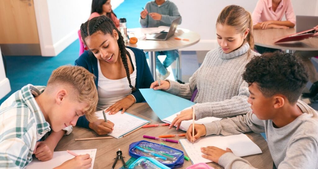 Students sitting around a table working together