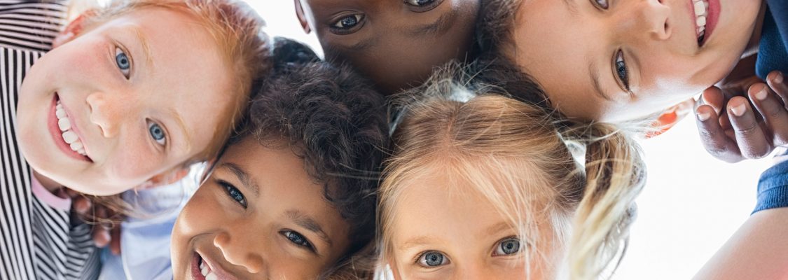 Multiethnic children in a circle racial equality