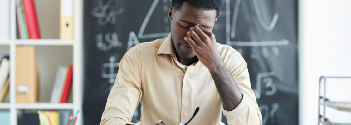 Teacher Stressed Teacher suffering from compassion fatigue.